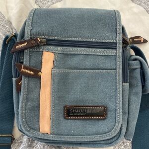 blue and tan shauli vintage crossbody bag